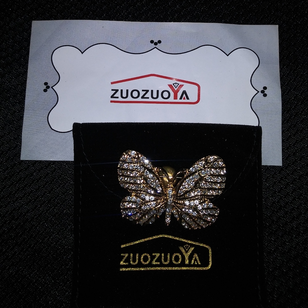 Nice butterfly brooch new in package never warn
